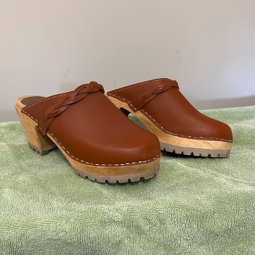 Swedish brown leather clogs.